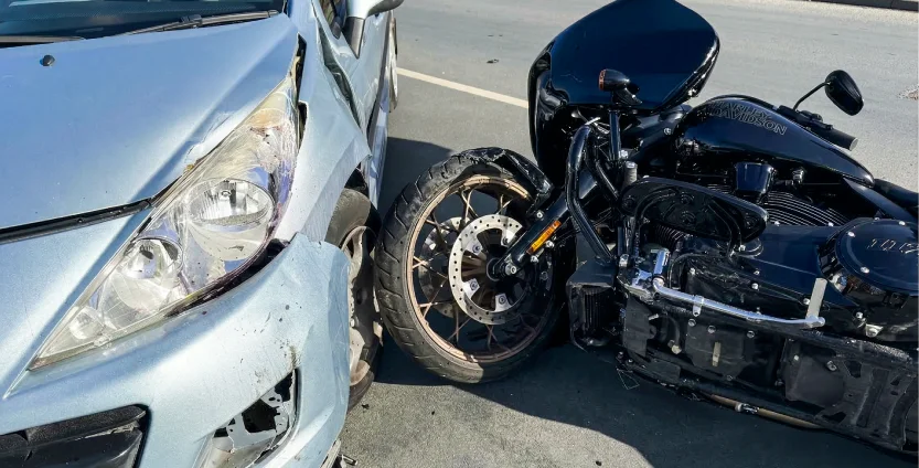 A Harley Davidson motorbike damaged on the floor, written-off after a non-fault accident