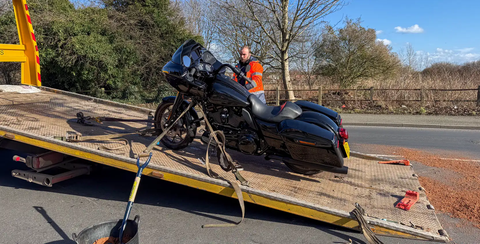 Harley Davidson Motorbike on a recovery truck after a non-fault accident